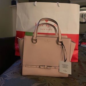Brand new with tags. Small Kate Spade purse